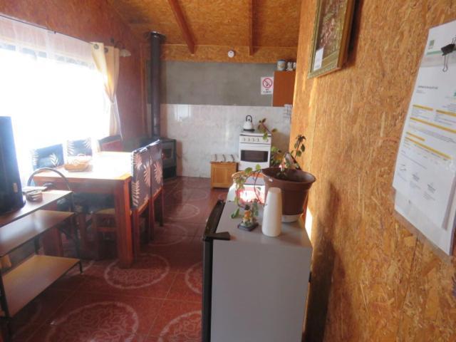 Hostal Y Cabanas Peumayen プエルト・グアダル エクステリア 写真