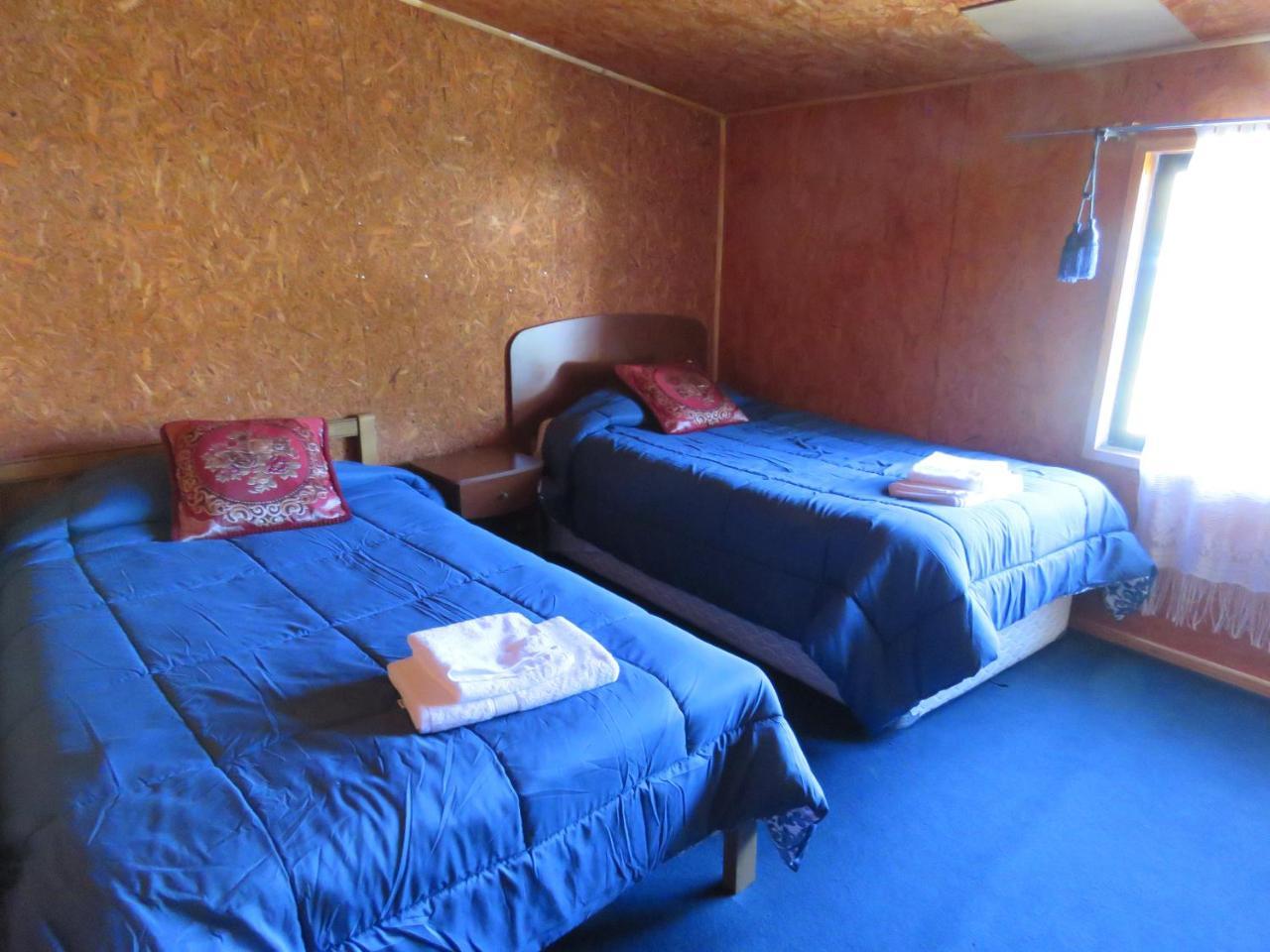 Hostal Y Cabanas Peumayen プエルト・グアダル エクステリア 写真